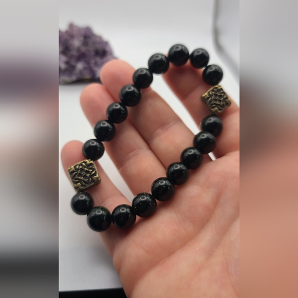 10mm green Goldstone bracelet with Tibetan style charms. - Picture 3 of 5